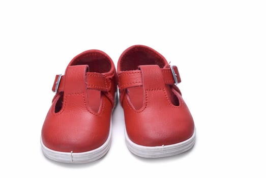 Shoes for kids isolated over a white background.
