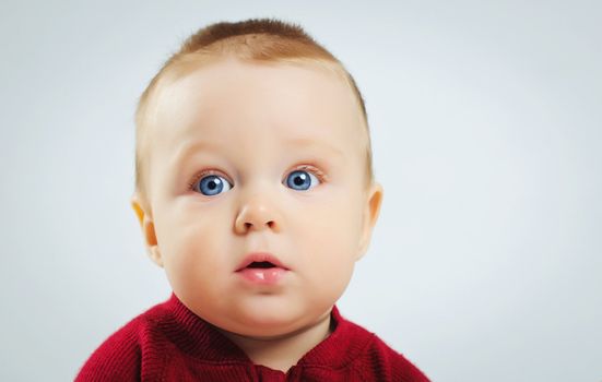 portrait of little boy looking at camera