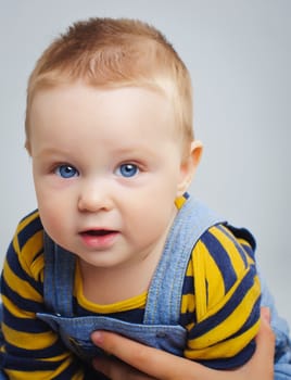 portrait of little boy looking at camera