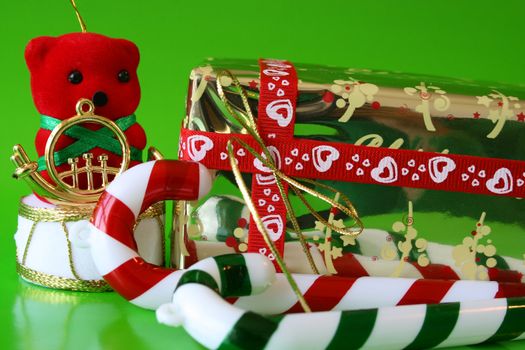 Christmas Decorations and a gold wrapped gift
