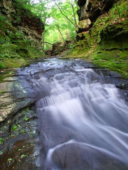 A waterfall running through Pewits Nest State Natural Area near the Wisconsin Dells.