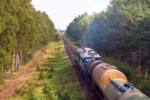 Freight train passing the countryside
