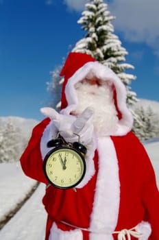 Santa Claus, Father Christmas holds watch clock