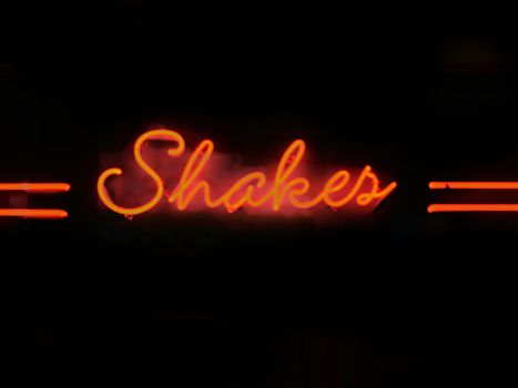 close up of shakes neon sign