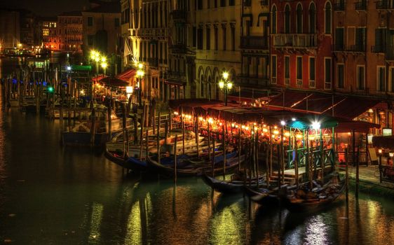 Night image in Venice on the Grand Canal in the vicinity of the Rialto Bridge.