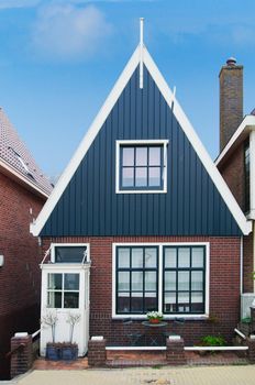 Dutch traditional house over blue sky, Volendam, Netherlands