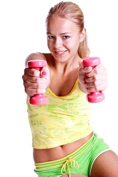 pink dumbbells in the hands of women on a white background