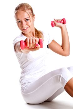 pink dumbbells in the hands of women on a white background