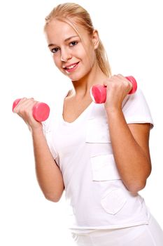 pink dumbbells in the hands of women on a white background