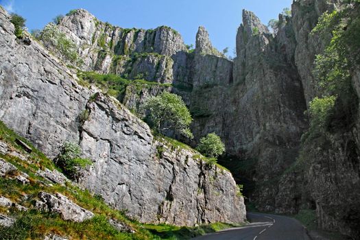 The cliffs of Cheddar Gorge in the Mendip Hills in Somerset, England are limestone and around 500 feet high.