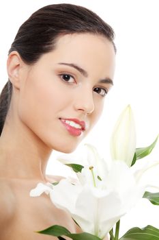 Spa woman with lily flower in white background