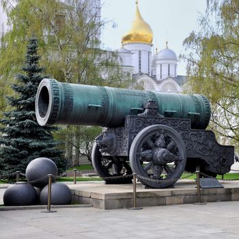 Historic cannon and balls in front of a church at the Kremlin