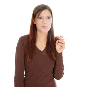 Young woman smoking electronic cigarette (ecigarette), isolated on white