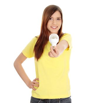 Young happy woman holding diode bulb, isolated on white