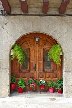 Detail of the Facade of Spanish Homes Decorated with Flowers