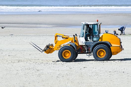 Work at the beach - preparing for summerseason - lifting and transportation