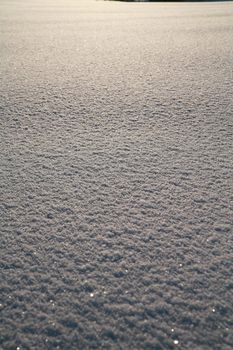 Details of a beautiful snow surface perfect for backgrounds on greeting cards etc.