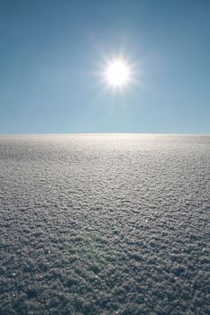 Details of a beautiful snow surface perfect for backgrounds on greeting cards etc.