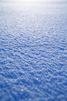 Details of a beautiful snow surface perfect for backgrounds on greeting cards etc.