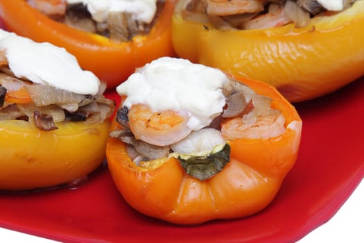 Stuffed pepper with shrimps, mushrooms, onion and sour cream