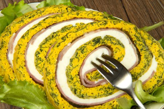 Gourmet spinach rolls  with eggs, ham and cheese