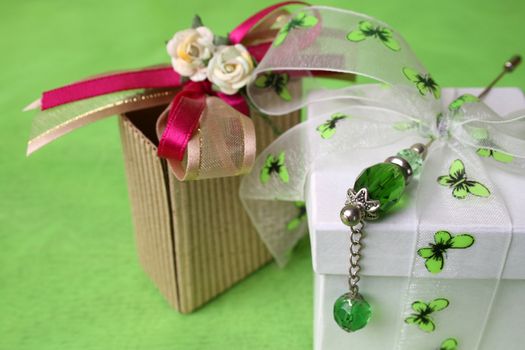 White gift box and small brown gift bag
