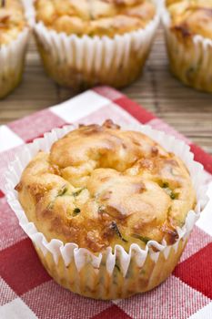 Freshly baked spinach and cheese muffins ready to be served