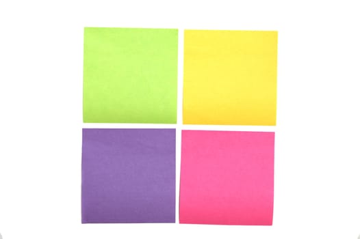 Four multi colored post it notes spaced evenly