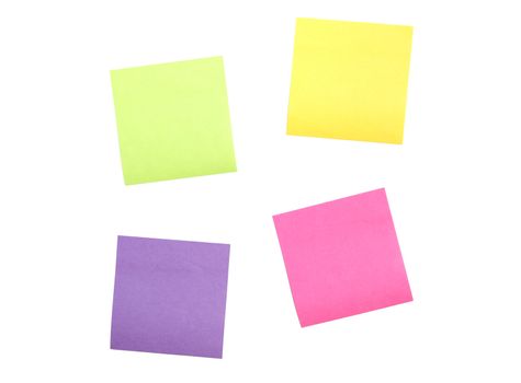 Four multi colored post it notes scattered far apart