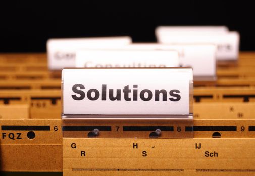 solution word on business folder showing solving a problem concept