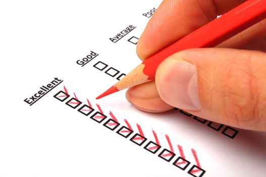 customer service survey with checkbox on form an red pencil
