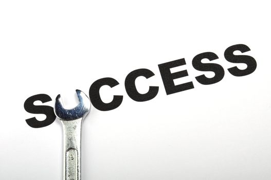 success concept with word and tool showing business growth