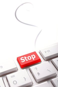 stop key on keyboard in red showing halt concept
