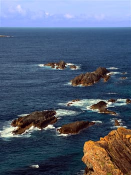 View of the Pacific Ocean from the rocky coast of Booti Booti National Park in Australia.