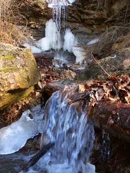 A small waterfall of melting snow at Kickapoo State Park in Illinois.