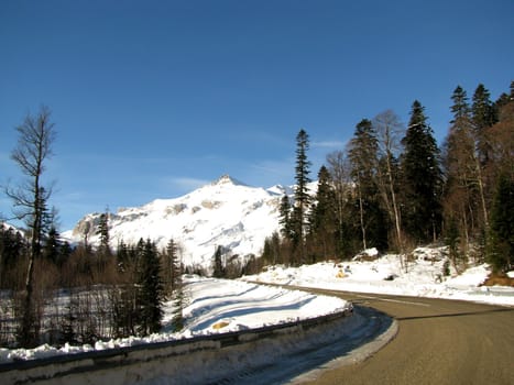 The main Caucasian ridge; rocks; a relief; a landscape; a hill; a panorama