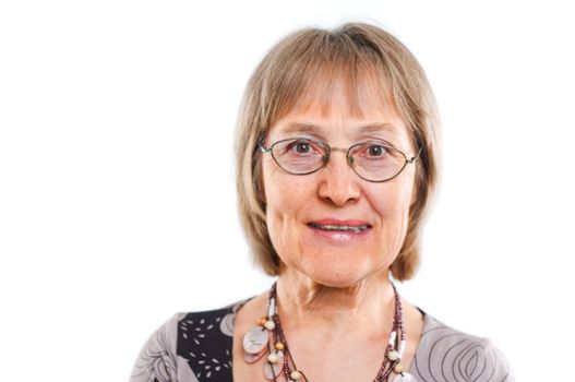 Portrait of a happy aged woman smiling