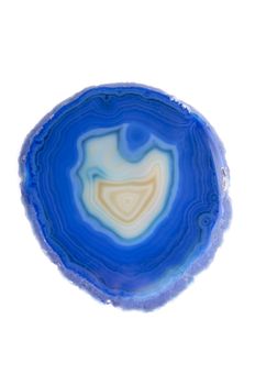 Close up of slice of agate stone on a white