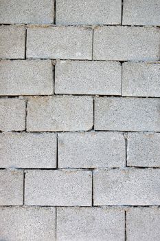 Cinder block brick wall texture background pattern.