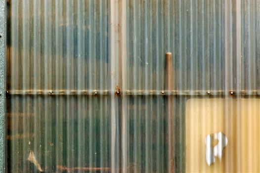 Corrugated plastic sheets background. Greenhouse construction detail.