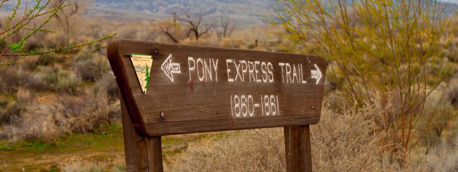 A photograph of an old Pony Express Trail Sign.
