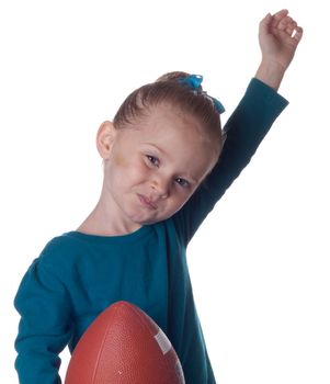 An adorable young child has just scored a touchdown!!!