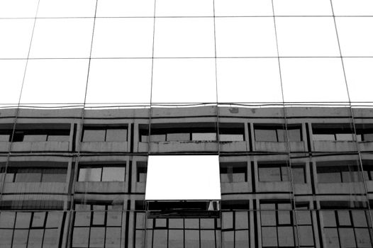 Modern glass building with open window. Abstract architecture background.