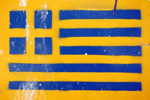 Greek flag stencil on metal surface. Weathered grunge background.