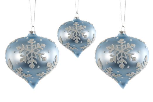 Beautiful glass ornaments with snow flake designs on them