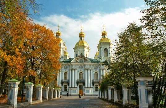 Russian cathedral with three cupola on the foreground
