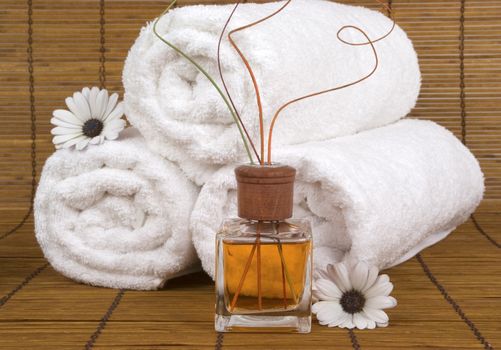 Aromatherapy, spring daisies and soft towels