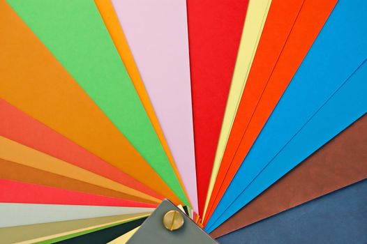 Paper sampler chart background. Different weights and colors of printing paper.