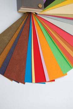 Paper color guide background. Different weights and colors of printing paper.