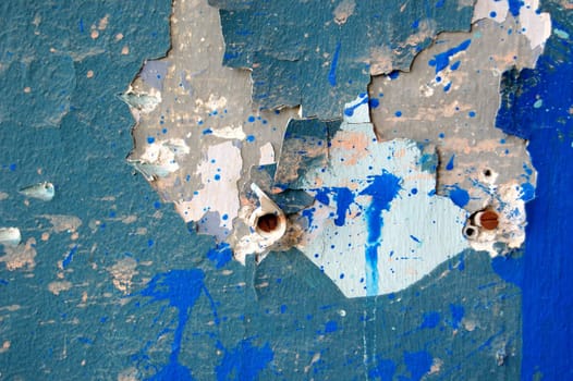 Weathered wall peeling paint surface background detail. Abstract texture.